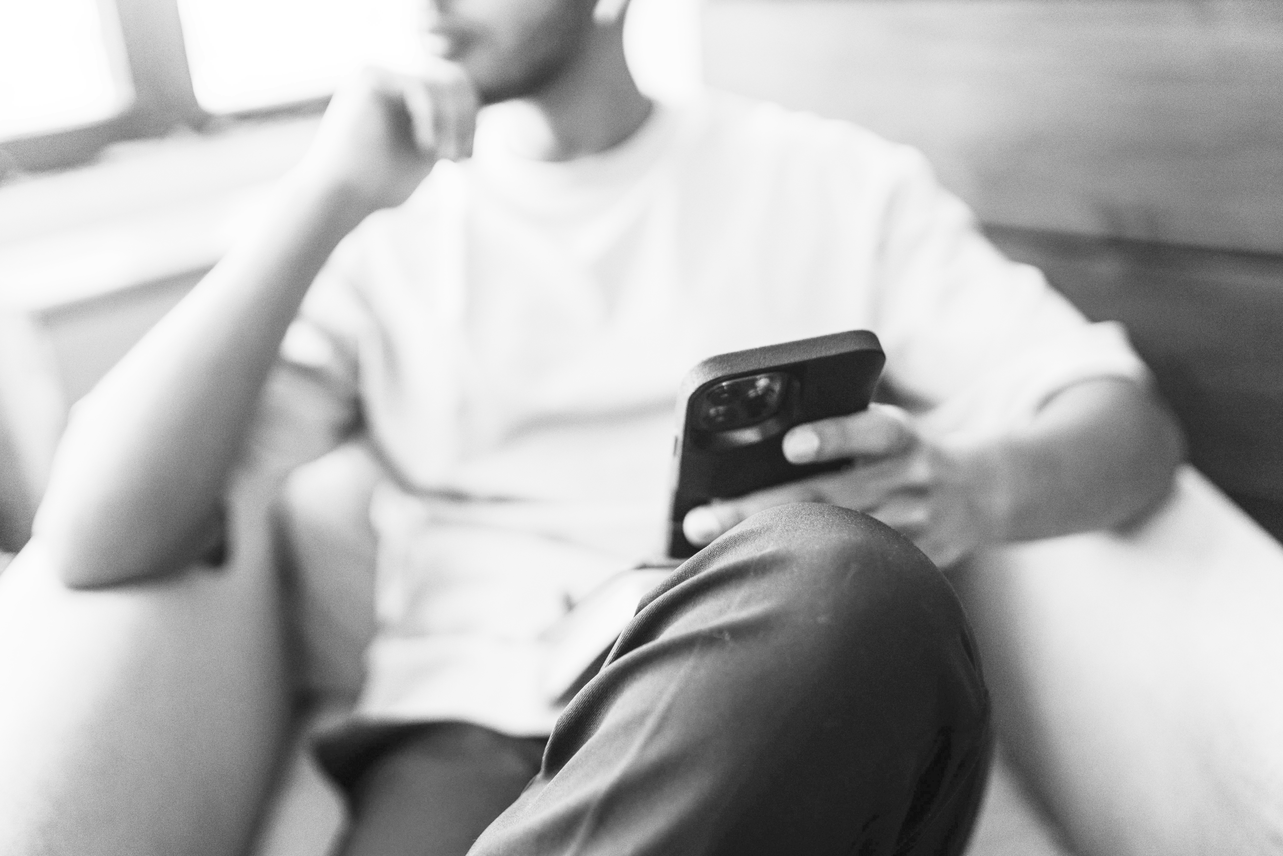 Group of colleagues greeting each other in a stylized blue duotone treatment